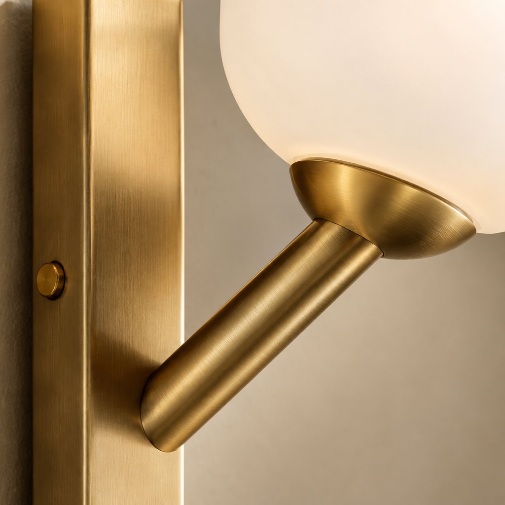 Lucca brushed brass wall sconce with frosted glass globe — view 3